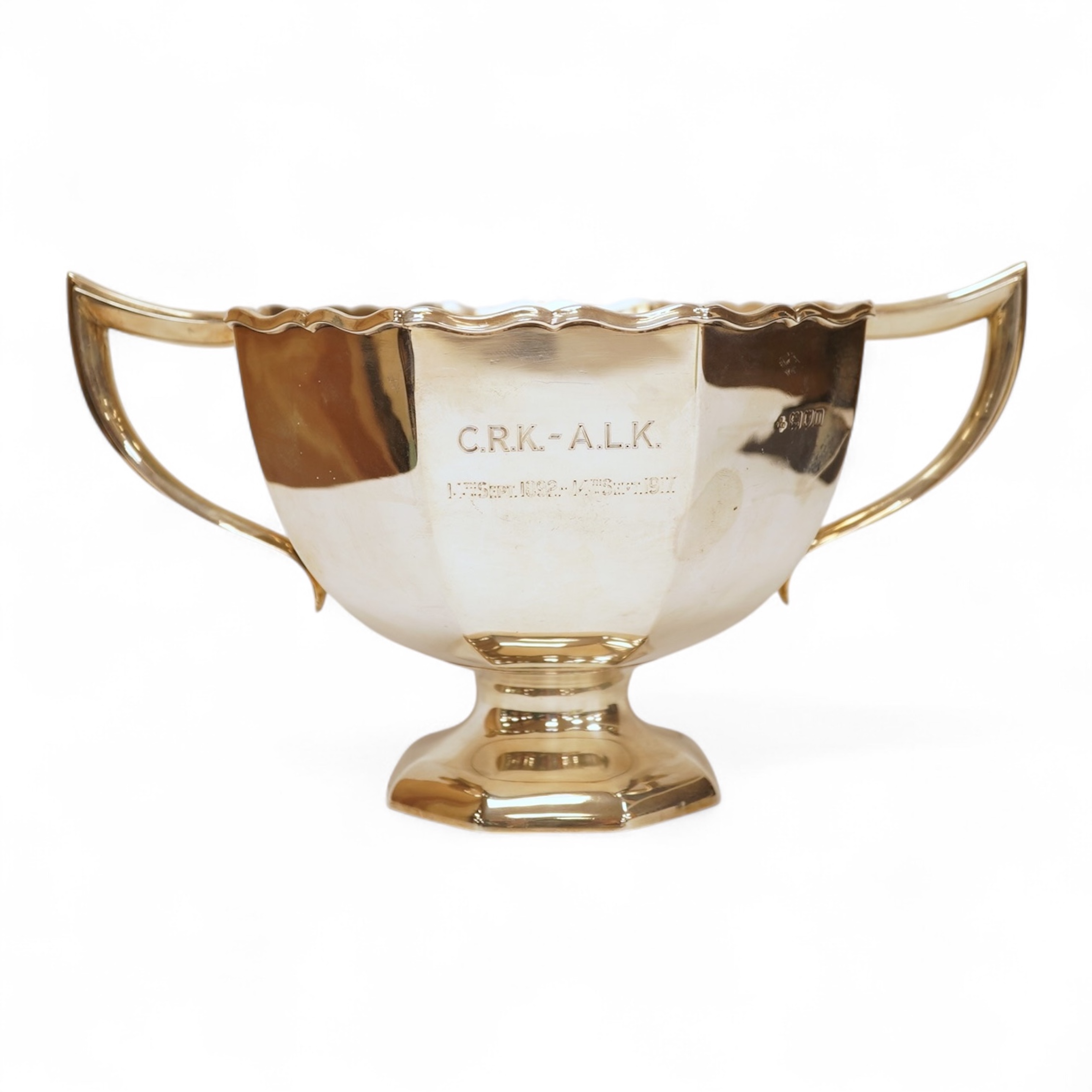 An Edwardian silver two handled pedestal presentation bowl, by Horace Woodward & Co, London, 1980, with later engraved inscription, height 12.7cm, 15.9oz.